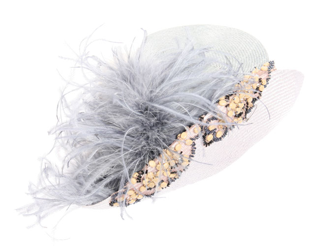 Feathered hat, $225, Lilliput-Hats, www.lilliputhats.ca