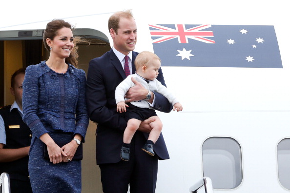 WELLINGTON, NEW ZEALAND - APRIL 16:  Catherine, Duchess of Cambridge, Prince William, Duke of Cambridge and Prince George of Cambridge look on before boarding a Royal Australian Air Force plane for their flight to Australia at Wellington Airport's military terminal April 16, 2014 in Wellington, New Zealand. The Duke and Duchess of Cambridge are on a three-week tour of Australia and New Zealand, the first official trip overseas with their son, Prince George of Cambridge. (Photo by Hagen Hopkins/Getty Images)