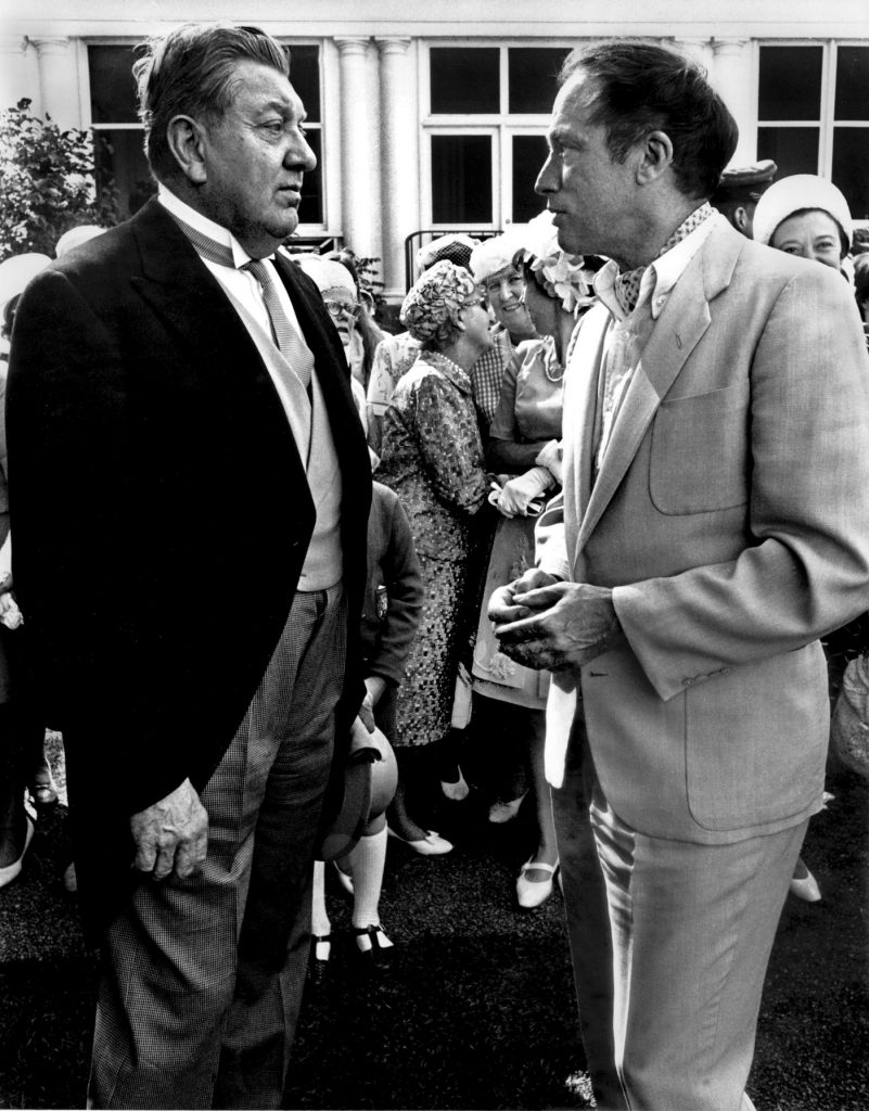 U.S. Ambassador W. Walton Butterworth (1903Ð1975) chats with Prime Minister Pierre Trudeau at the Governor General's garden party in Ottawa July 1968. Butterworth wore the traditional garb for such events at Rideau Hall for the VIP enclosure. Trudeau having been just elected Prime Minister a month earlier appeared in ascot and tan silk suit. The formal attire gave way to more comfortable clothes in subsequent years at the annual garden party. Butterworth was a career diplomat with a forty-year series of diplomatic posts. THE CANADIAN PRESS/ Peter Bregg
