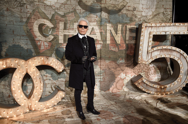 Lagerfeld arriving for the debut screening of Chanel's No5 Film by Baz Luhrman in 2014