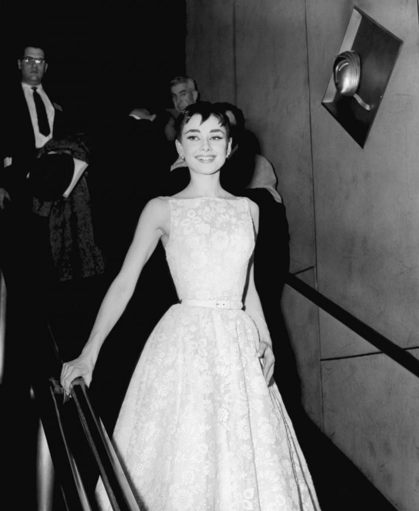 26TH ANNUAL ACADEMY AWARDS -- Pictured: Actress Audrey Hepburn, wearing a Givenchy gown, at the 26th Annual Academy Awards at the NBC Century Theatre in New York City, on March 25, 1954 (Photo by NBC/NBCU Photo Bank via Getty Images)