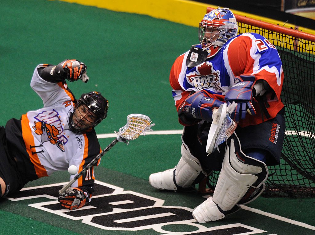 May 1, 2010 -John Tavares of the Buffalo Bandits tries to get a shot on Bob Watson of the Toronto Rock during their Lacrosse playoff game at the ACC. The Toronto Rock defeated the Buffalo Bandits 13-11. (Photo by Carlos Osorio/Toronto Star via Getty Images)