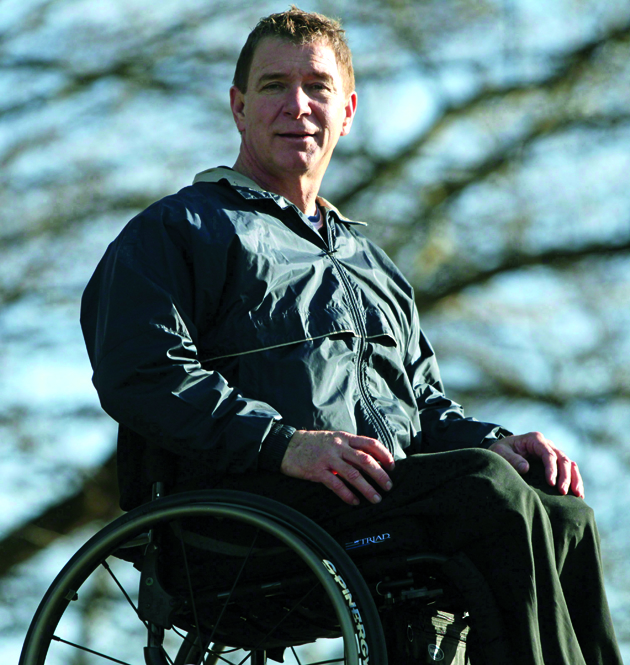 It has been exactly 25 years since Canada's "Man in Motion," Rick Hansen, completed his round-the-world tour to raise funds for spinal cord research. Hansen poses for a photograph outside his foundation's offices in Richmond, B.C., on Sunday January 30, 2011. THE CANADIAN PRESS/Darryl Dyck