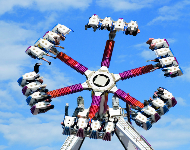 "Ground view of midway spinning ride in Toronto, Canadian National Exhibition.More thrills:"