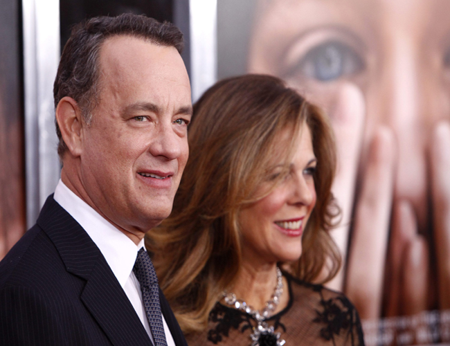 Actors Tom Hanks and Rita Wilson attend the premiere of "Extremely Loud & Incredibly Close" at the Ziegfeld Theater on Thursday, Dec. 15, 2011, in New York. (AP Photo/Peter Kramer)