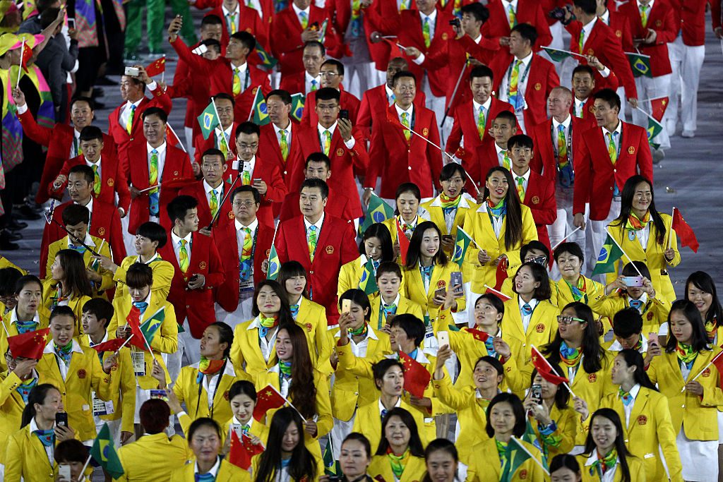 RIO DE JANEIRO, BRAZIL - AUGUST 05: Members of the China Olympic team takes part in the Opening Ceremony of the Rio 2016 Olympic Games at Maracana Stadium on August 5, 2016 in Rio de Janeiro, Brazil. (Photo by Paul Gilham/Getty Images)