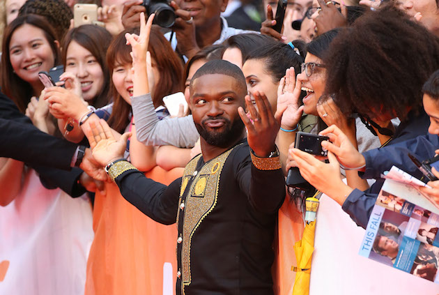 TORONTO, ON - SEPTEMBER 10: David Oyelowo greets fans at the 2016 Toronto International Film Festival - "Queen Of Katwe" premiere held at Roy Thomson Hall on September 10, 2016 in Toronto, Canada. (Photo by Michael Tran/WireImage)