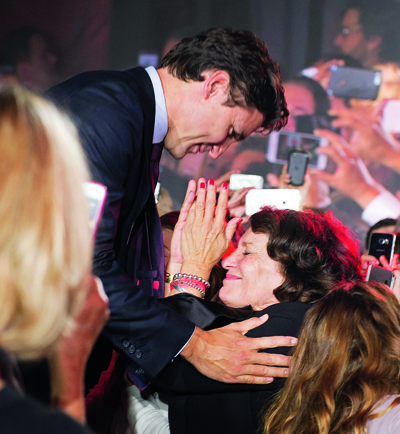 Liberal leader and incoming prime minister Justin Trudeau hugs his mother Margaret Trudeau as he makes his way on stage at Liberal party headquarters in Montreal on Monday, Oct. 19, 2015 after winning the 42nd Canadian general election. THE CANADIAN PRESS/Justin Tang