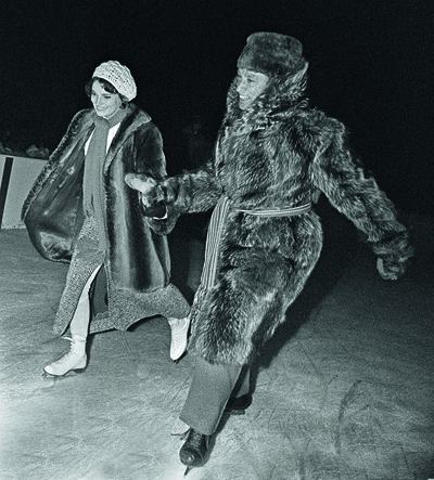 Prime Minister Pierre Trudeau accompanies Miss Margaret Sinclair, at the annual Governor General's skating party for members of Parliament in Ottawa Jan. 14, 1970. (CP PHOTO/Peter Bregg)
