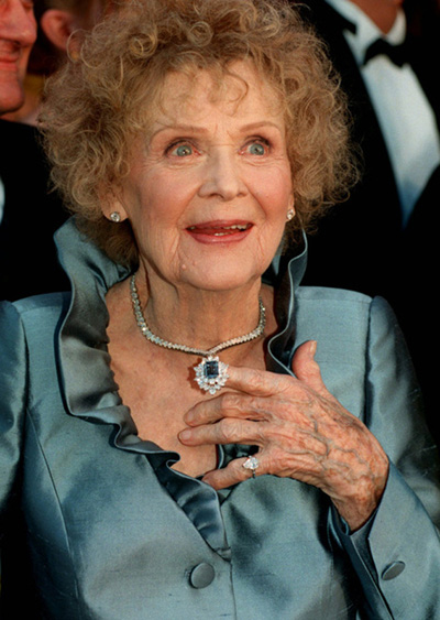 Lady in blue: Gloria Stuart arrives at the 70th Annual Academy Awards wearing one of the world's biggest blue diamonds -- a tribute, courtesy of jeweler Harry Winston, to the signature gem her character tossed into the sea in Titanic.