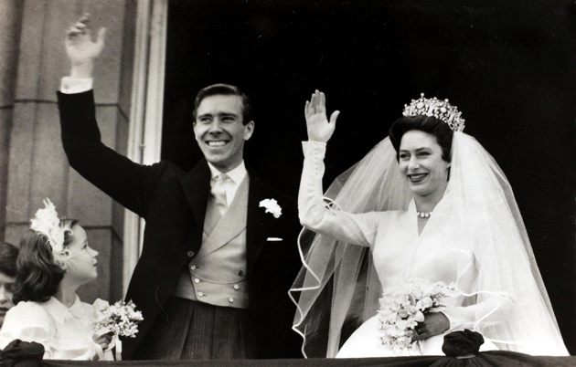 British Royalty, London, England, 6th May 1960, H,R,H, Princess Margaret with her Anthony Armstrong-Jones wave to the crowd from the balcony of Buckingham Palace after they had been married in Westminster Abbey (Photo by Bob Thomas/Popperfoto/Getty Images)