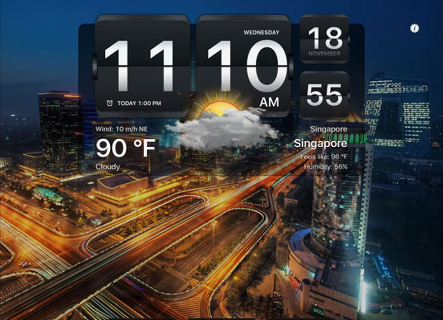 A tablet displaying the time and a cityscape in the background. 