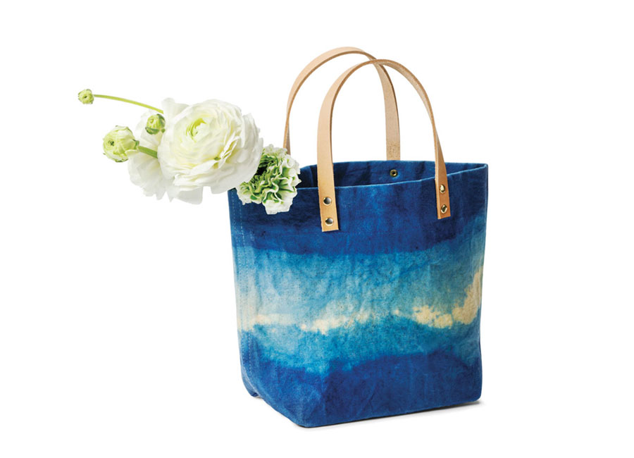 Ombre blue canvas shopper holding flowers