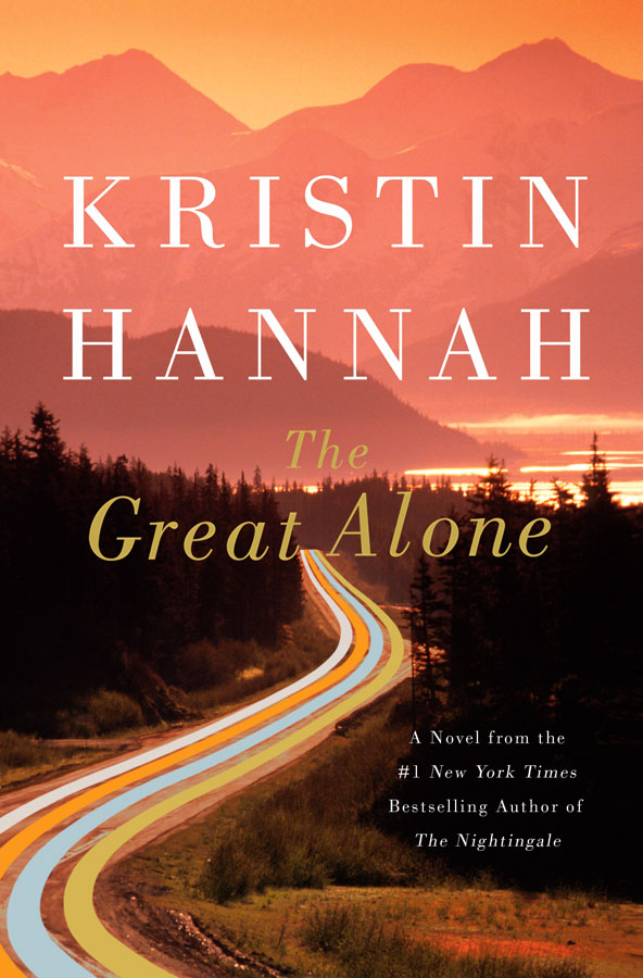 The book cover for The Great Alone featuring a winding road with forest on each side. 