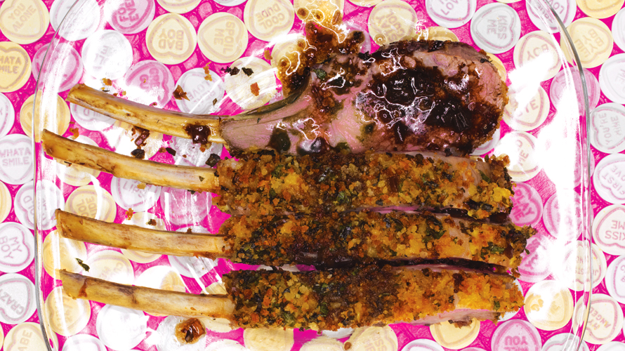 A rack of lamb seasoned with spices.