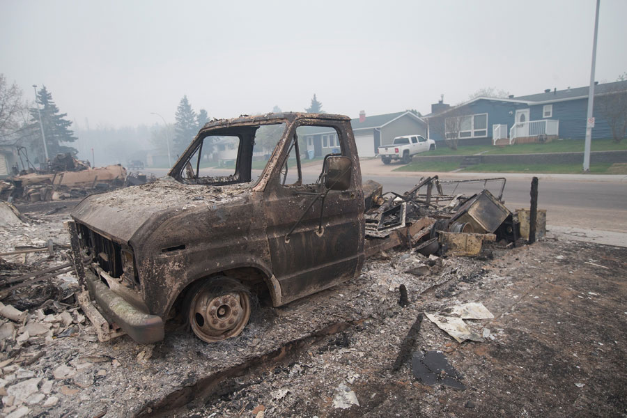A scorched pickup truck on a residential street in Alberta Fort McMurray after the fires. 