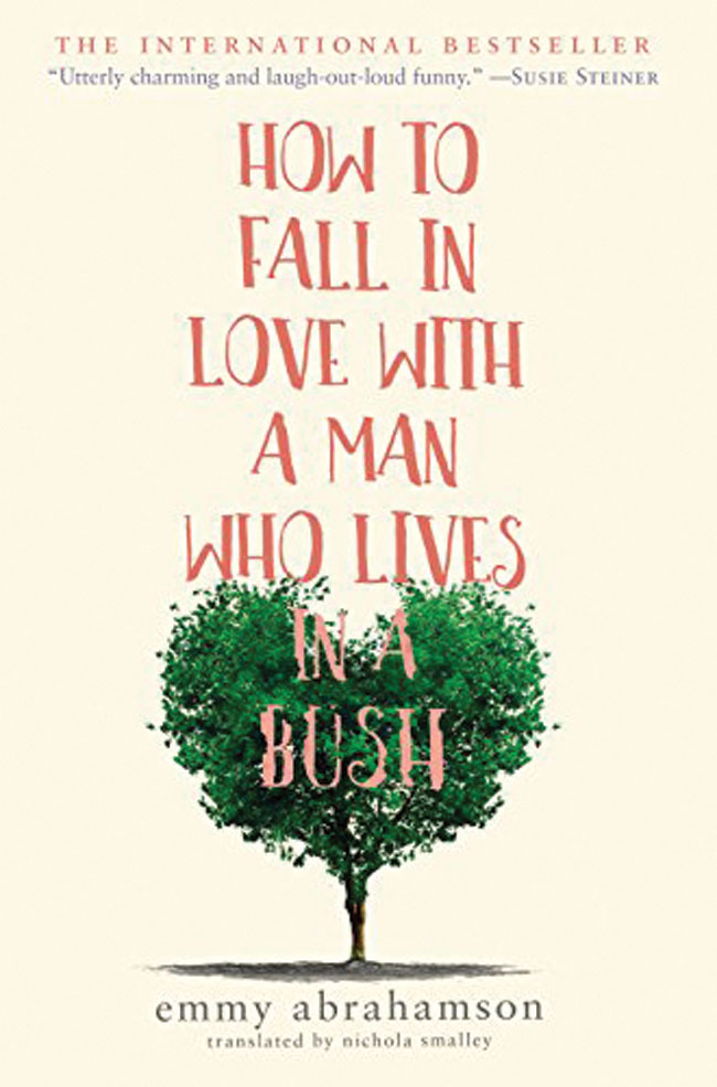 The book cover for How To Fall In Love With a Man Who Lives In a Bush. The title in red capital letters overtop of a small bush. 
