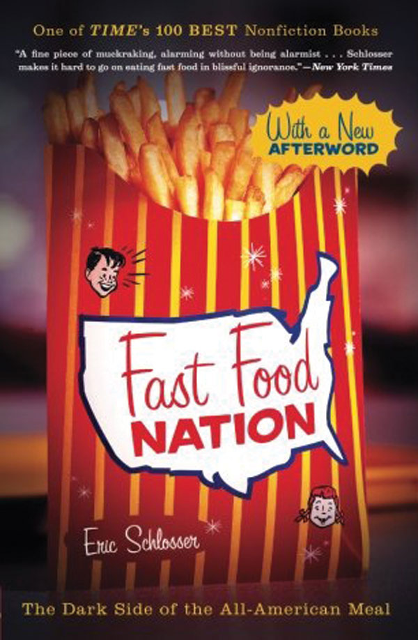 The book cover for fast food nation. The title is written on the front of a carton of fries. 