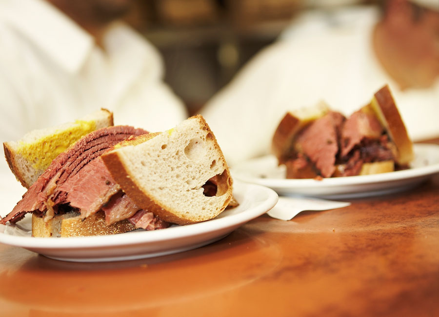 Two Montreal smoked meat sandwiches. 