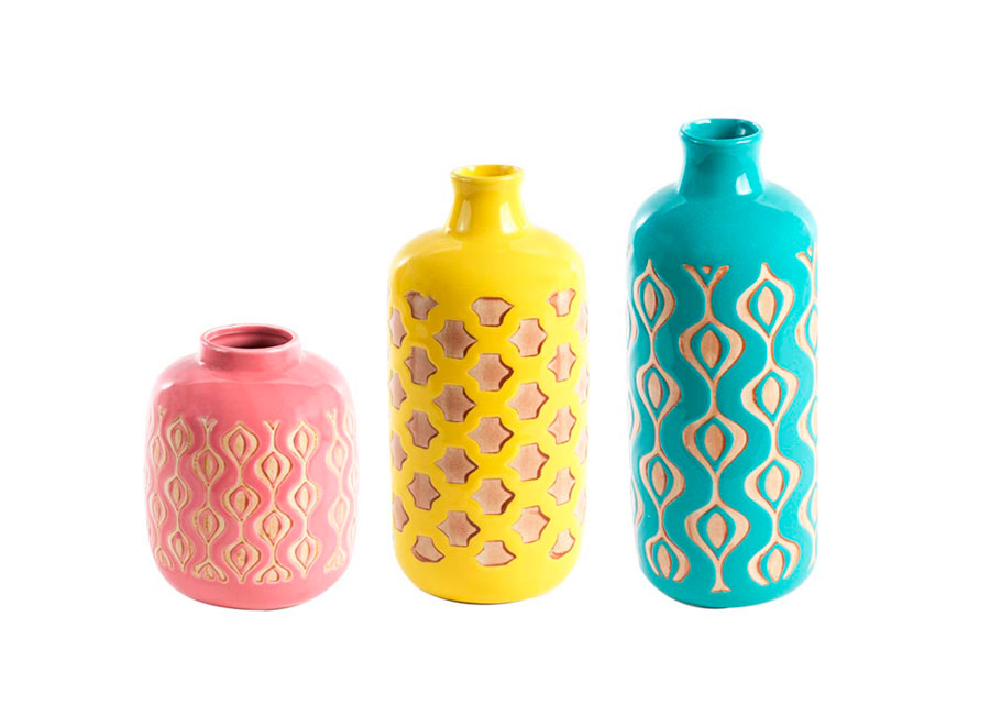 Three pastel ceramic vases (peach, yellow and teal)