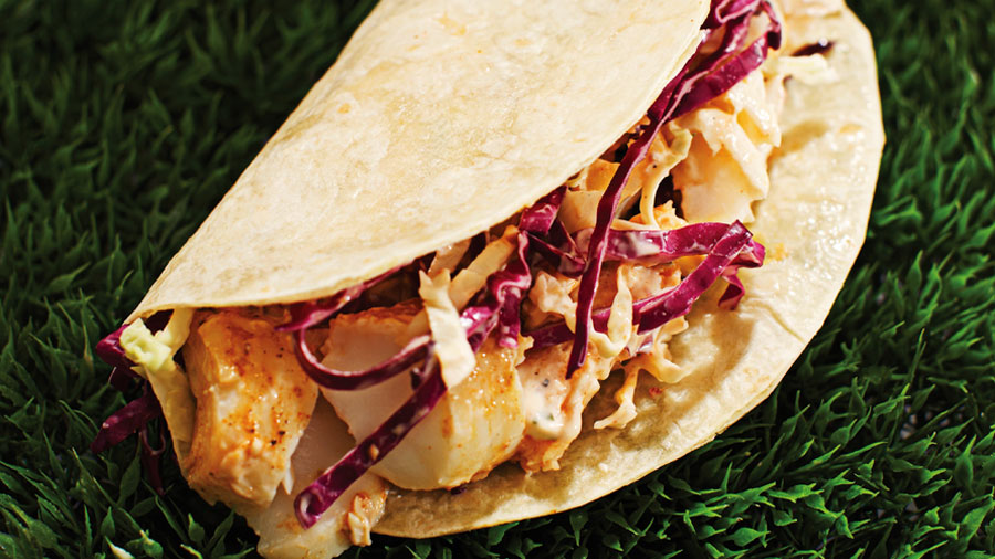 Tender cod marinated in spice and zesty lime, baked to juicy perfection and folded in a tender tortilla with a spicy chipotle lime dressing and crunchy cabbage.