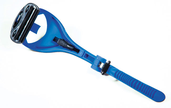 A photo of the Bakblade a back hair shaver that is the size of a back scratcher. 