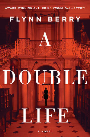 The book cover for A Double Life. Behind the text is a woman standing in doorway of a large foyer seen through a red filter. 
