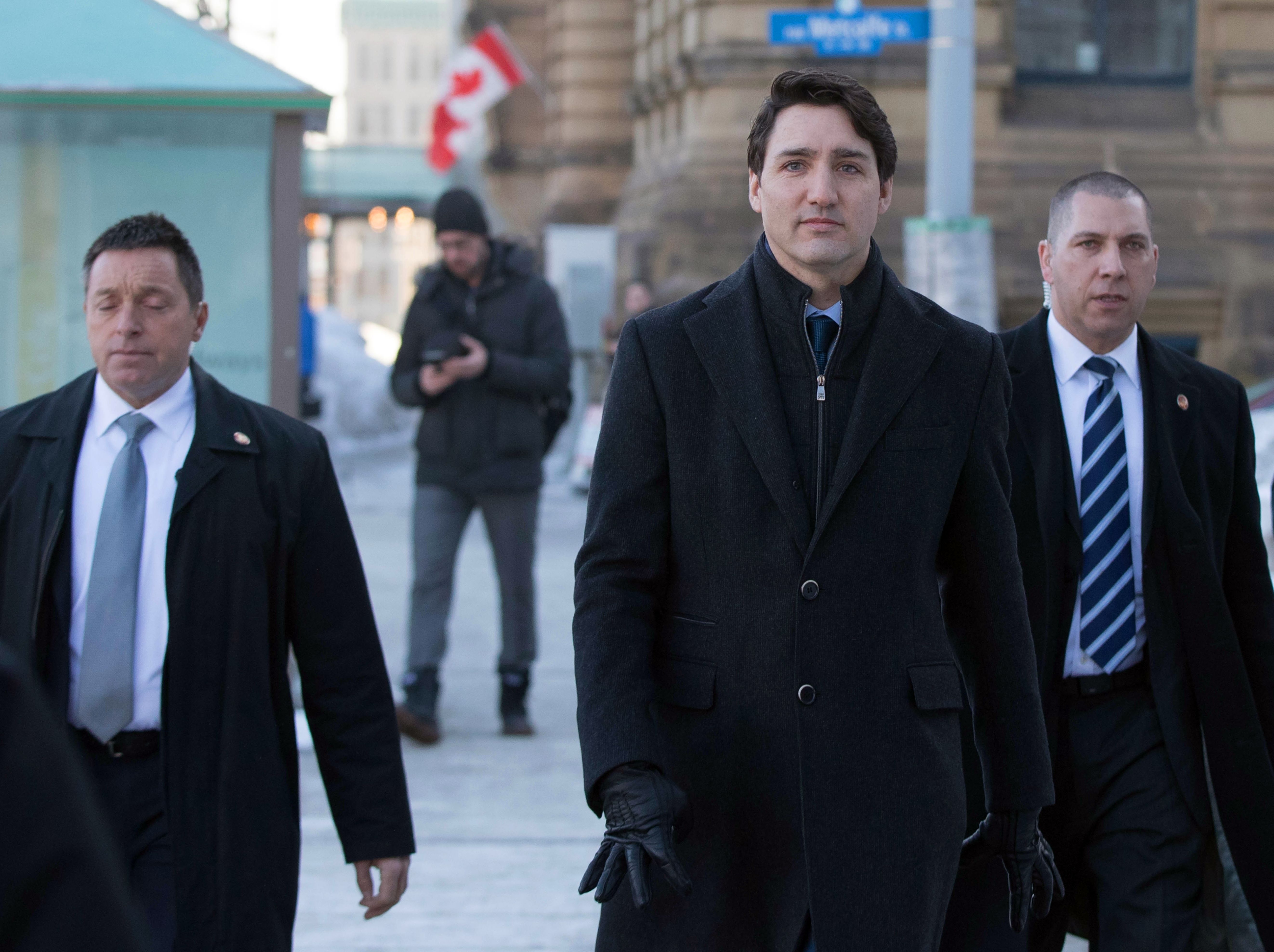 Canadian Prime Minister Justin Trudeau walks to a press conference addressing the SNC-Lavalin scandal from the Prime Minister's office in Ottawa, Ontario, on March 7, 2019. (Photo credit should read LARS HAGBERG/AFP/Getty Images)