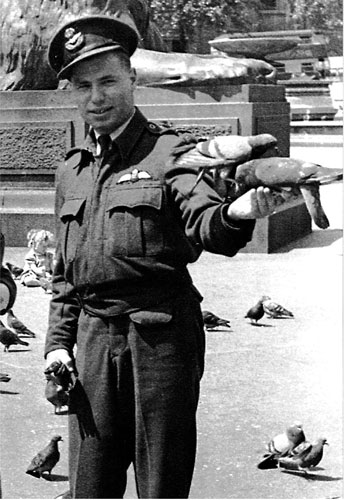 Flying Officer William “Bill“ Novick feeding the pigeons in London’s Trafalgar Square