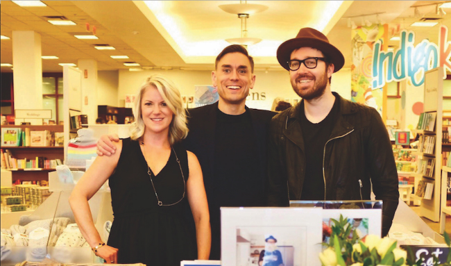 A photo of James Mullinger flanked by Pamela Mullinger and cookbook author and cover subject Dennis Prescott.