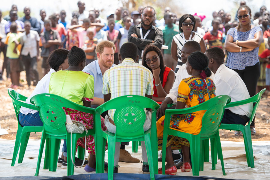 Prince Harry, Duke of Sussex takes part in a discussion with young people during a visit to the Mauwa Health Centre on day nine of the Royal tour of Africa. 