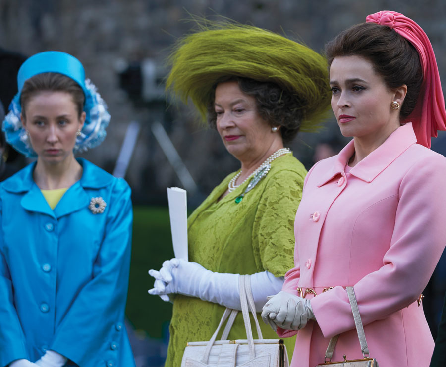 Erin Doherty, Marion Bailey and Helena Bonham Carter depict Princess Anne, the Queen Mother and Princess Margaret at the investiture of Prince Charles as the Prince of Wales, 1969.