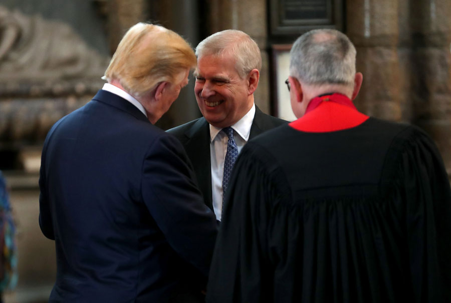 On a 2019 state visit to England, U.S. President Donald Trump and Prince Andrew, Duke of York share a laugh at Westminster Abbey, part of a three-day trip that included lunch with the Queen, a State Banquet at Buckingham Palace, and business meetings with the Prime Minister and the Duke of York.