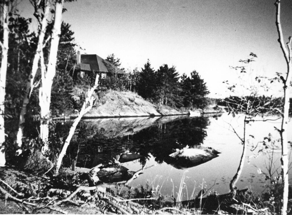 Mary Lawson's cottage on the lake, black and white, 1920.